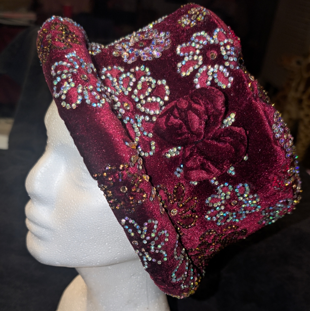 A burgundy velvet hat embellished with glass and Swavorsky crystal gems. - Picture 5 of 11